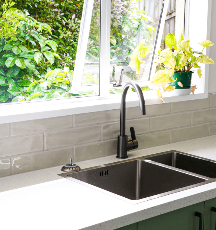 Close up of benchtop and sink in kitchen